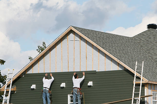 Professional Siding Replacement technician working in Polk City, FL